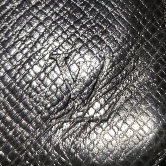 LV Taiga Black Leather Vertical Zippy Wallet